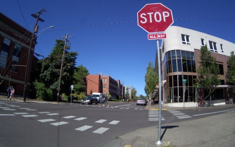 Typical streetview scene including a stop sign